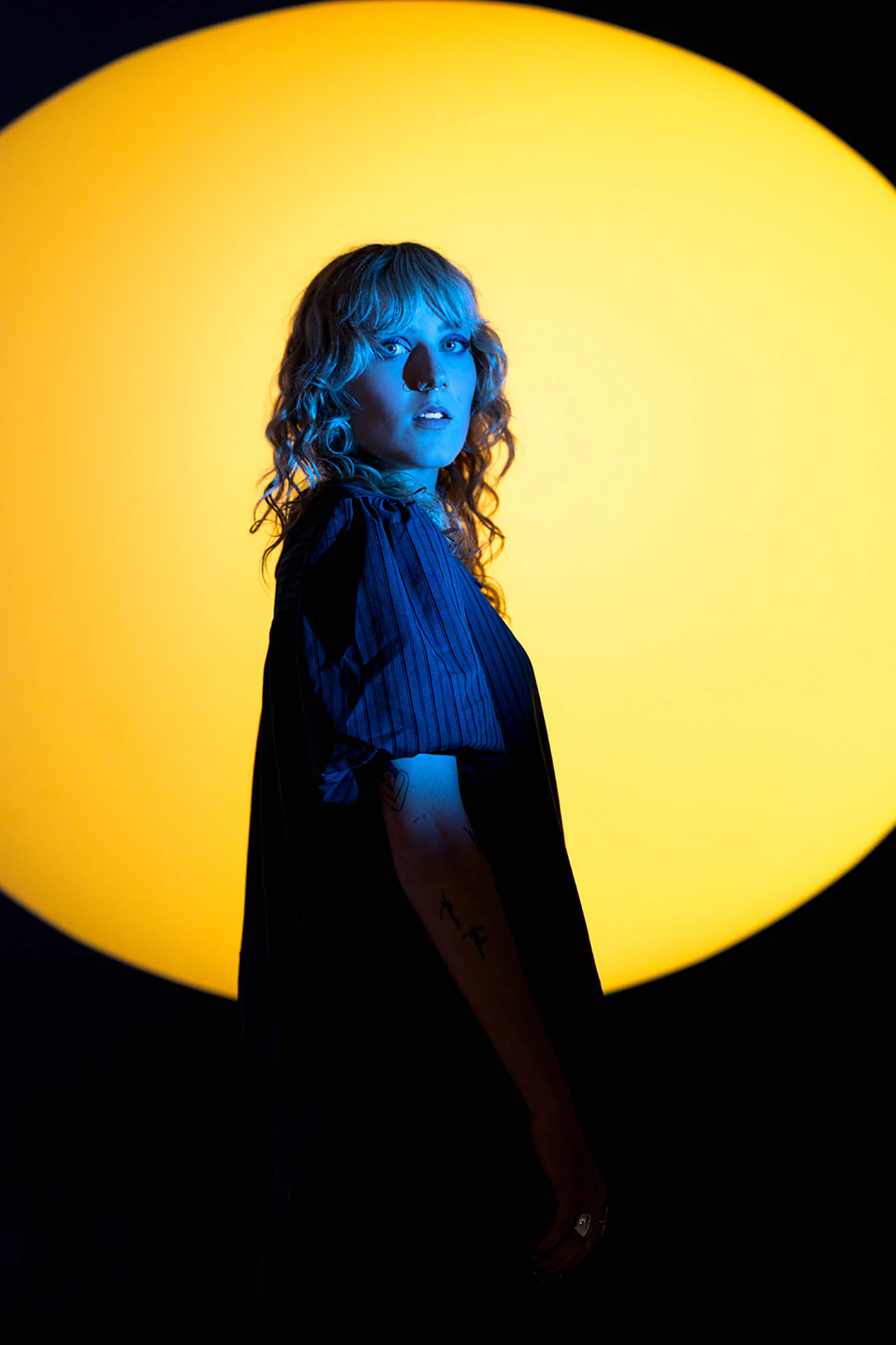 Olivia Carter under amber light